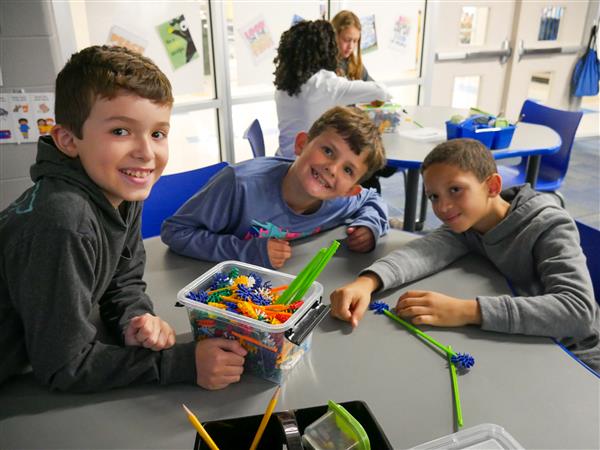 Students learning and having fun in Library.